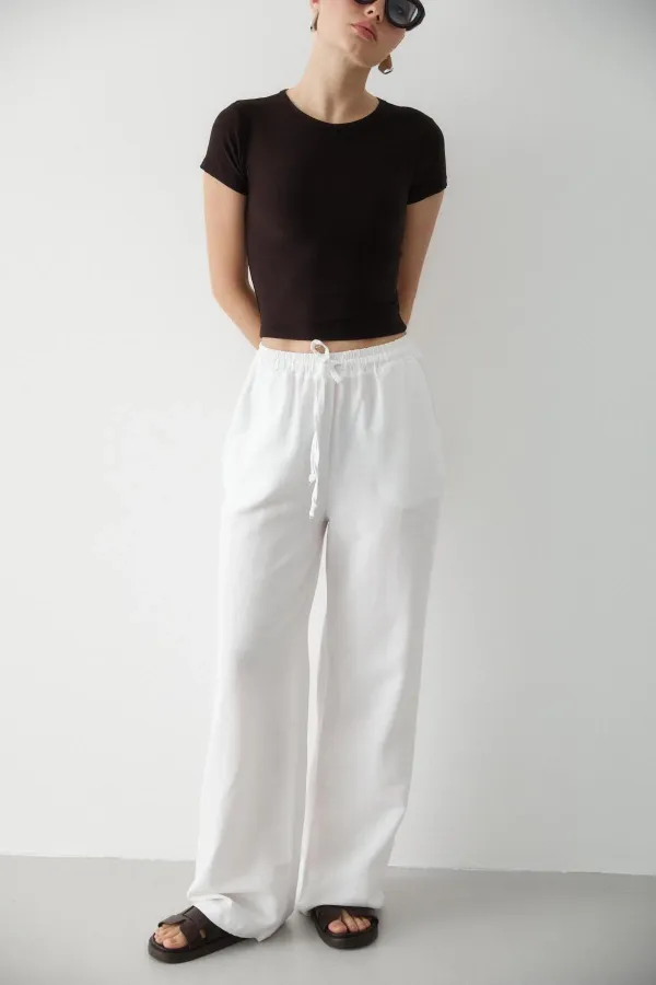 Pantalon blanc en coton et lin avec taille élastiquée