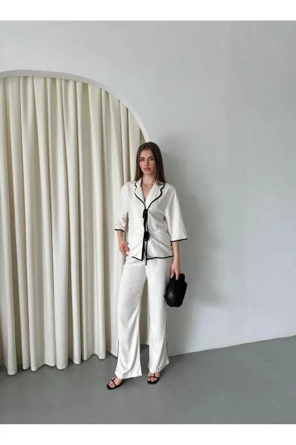 Ensemble chemisier et pantalon naturel à bordures noires