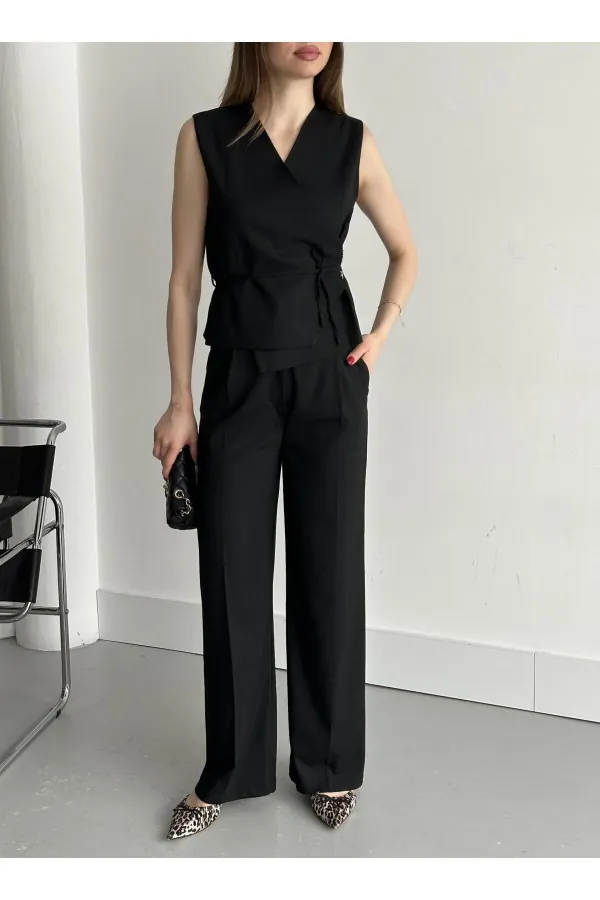 Ensemble gilet et pantalon noirs croisés