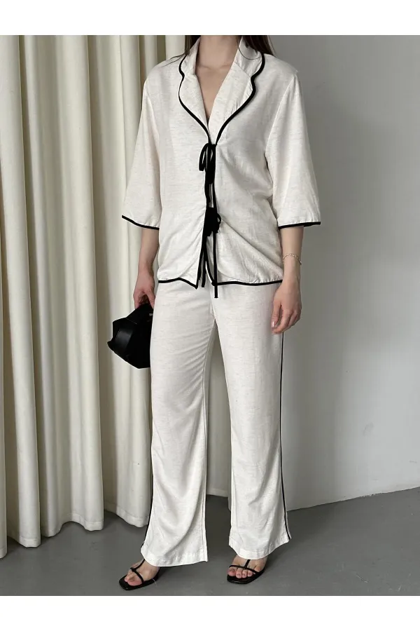 Ensemble chemisier et pantalon naturel à bordures noires