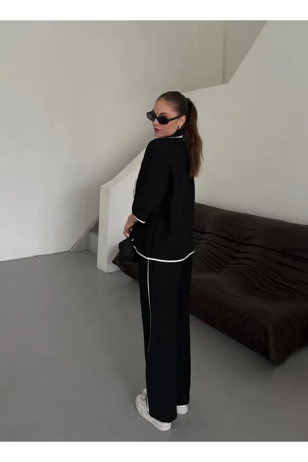 Ensemble chemisier et pantalon noir à bordures naturelles