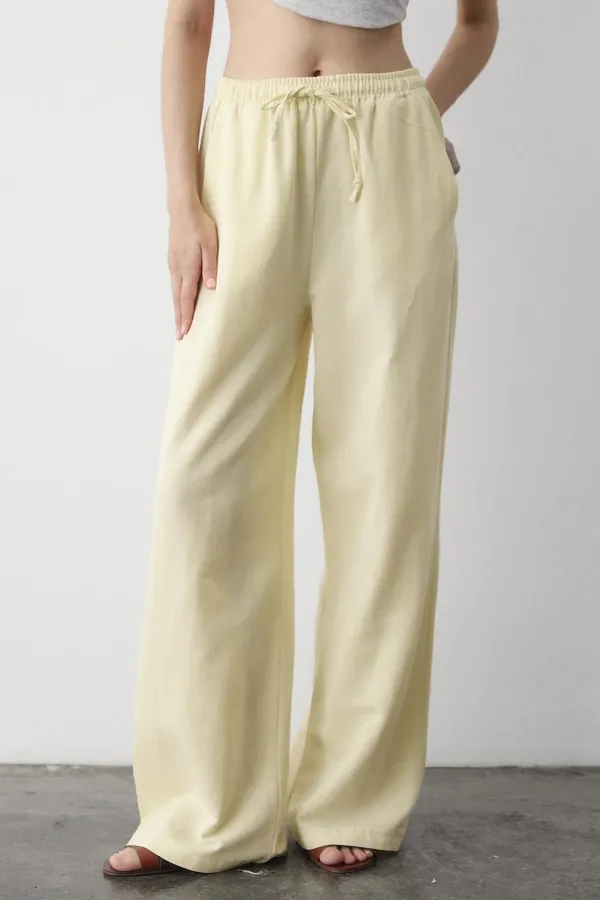 Pantalon jaune en coton et lin avec taille élastiquée