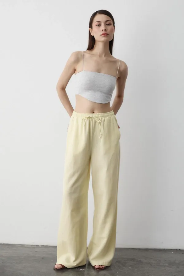 Pantalon jaune en coton et lin avec taille élastiquée