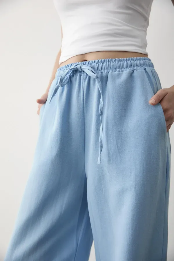 Pantalon bleu en coton et lin avec taille élastiquée