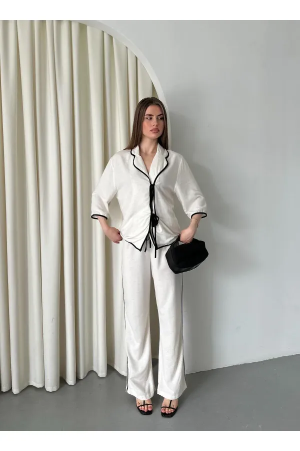 Ensemble chemisier et pantalon naturel à bordures noires