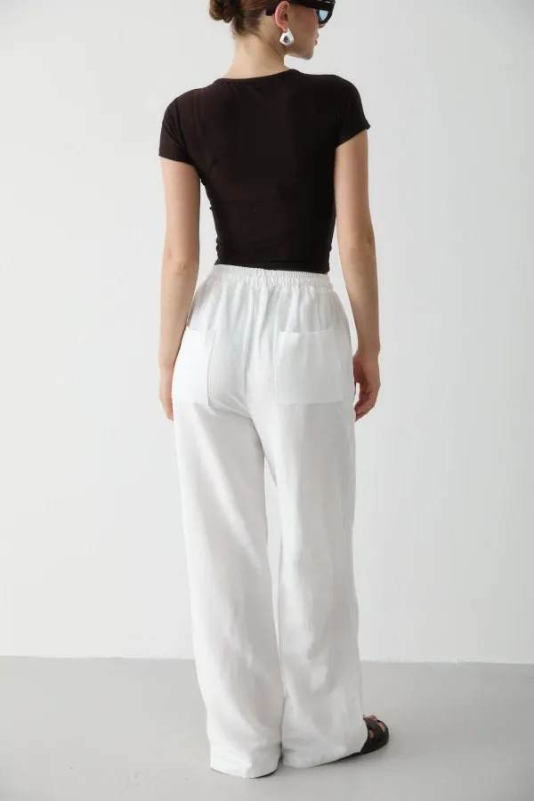 Pantalon blanc en coton et lin avec taille élastiquée
