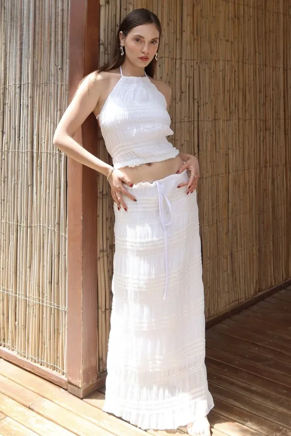 Ensemble chemisier et jupe en mousseline blanche à paillettes