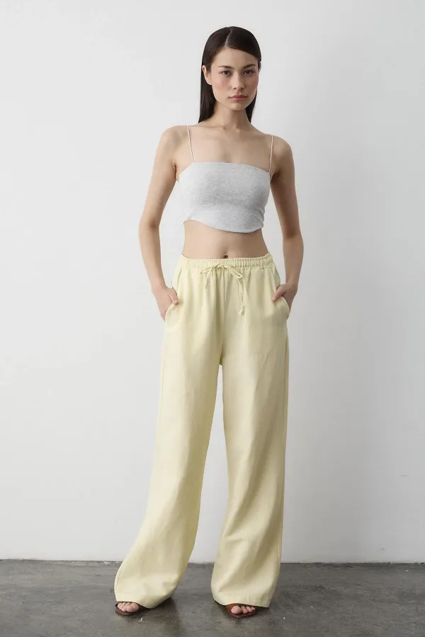 Pantalon jaune en coton et lin avec taille élastiquée