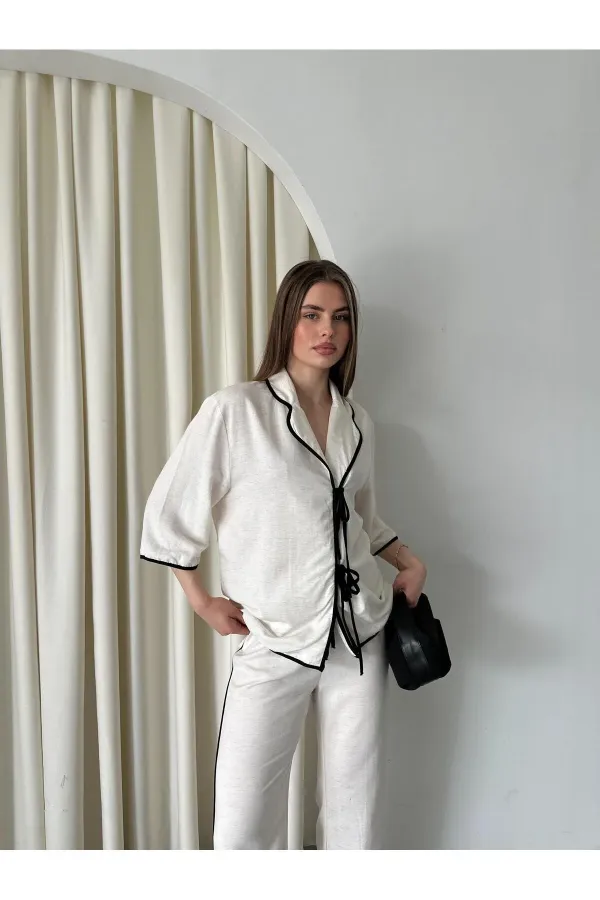 Ensemble chemisier et pantalon naturel à bordures noires