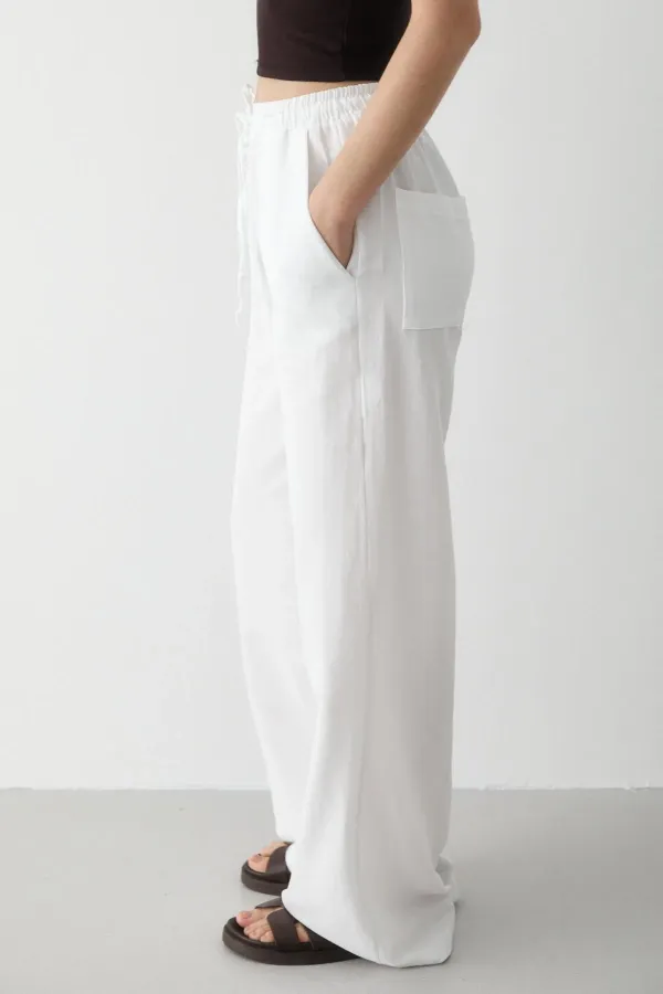 Pantalon blanc en coton et lin avec taille élastiquée