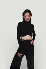 Pantalon en maille stretch noir à taille élastique et jambes larges