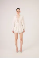 Robe Olanna blanche avec détails en dentelle et volants