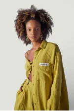 Chemise verte de la plage