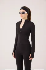 Veste Fabiola avec détails aux doigts et fermeture éclair, noire