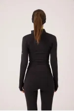 Veste Fabiola avec détails aux doigts et fermeture éclair, noire