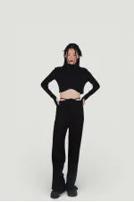 Pantalon en maille stretch noir à taille élastique et jambes larges