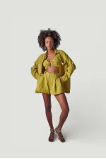 Chemise verte de la plage