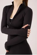 Veste Fabiola avec détails aux doigts et fermeture éclair, noire