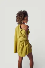 Chemise verte de la plage