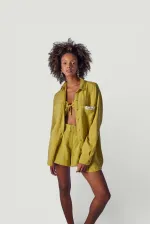 Chemise verte de la plage