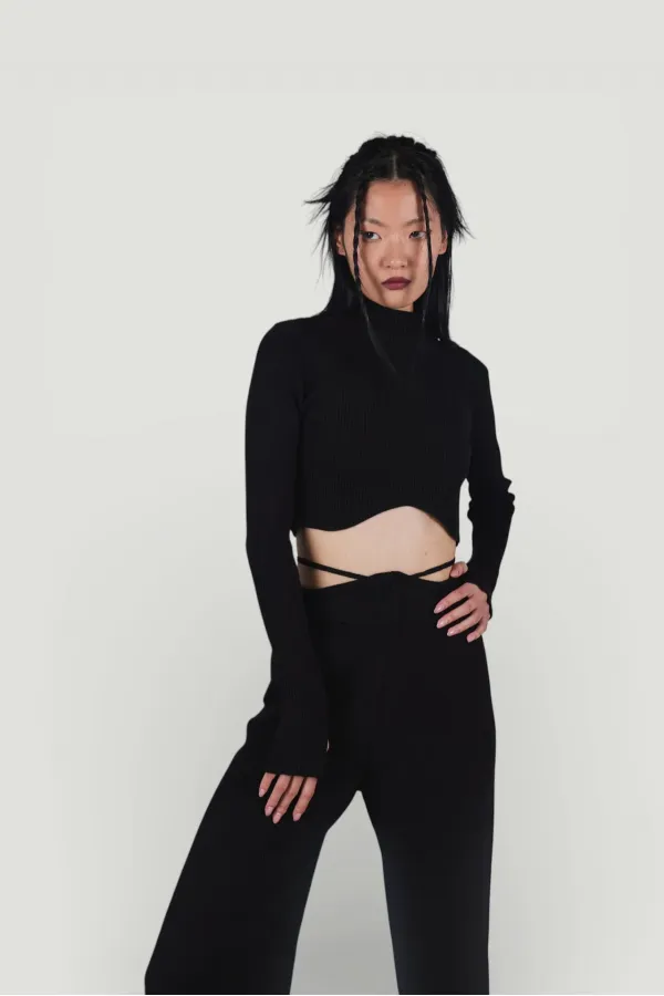 Pantalon en maille stretch noir à taille élastique et jambes larges