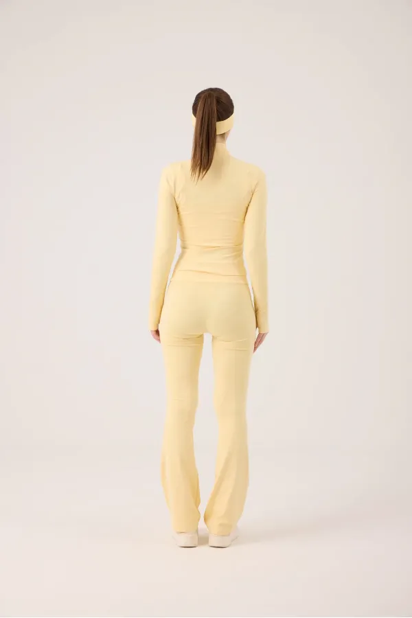 Veste Fabiola avec détails aux doigts et fermeture éclair, jaune