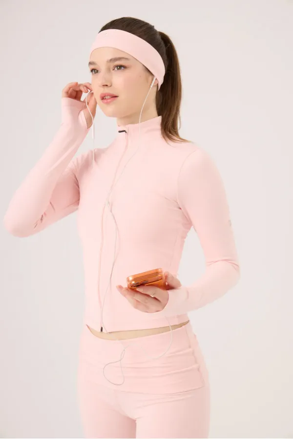 Veste Fabiola avec détails aux doigts et fermeture éclair, rose
