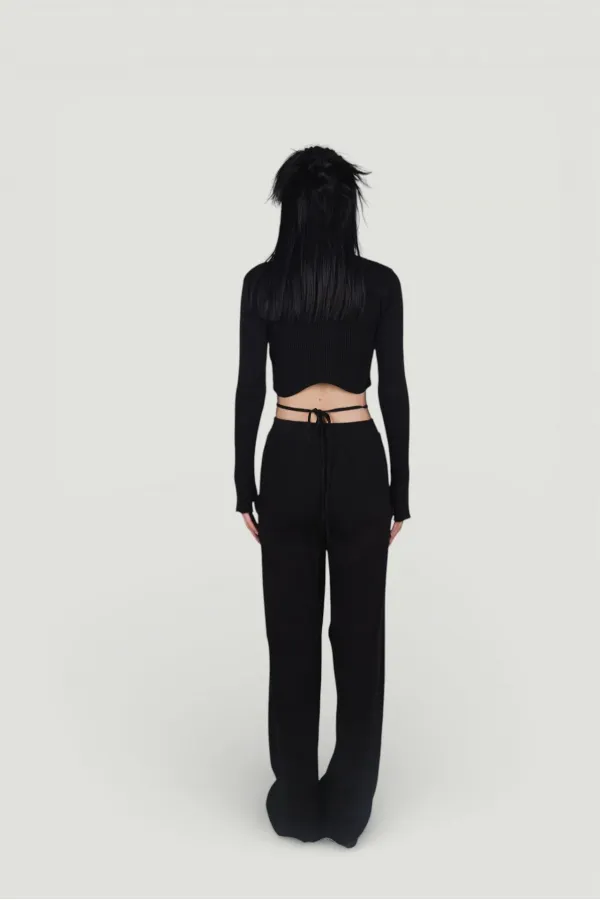 Pantalon en maille stretch noir à taille élastique et jambes larges