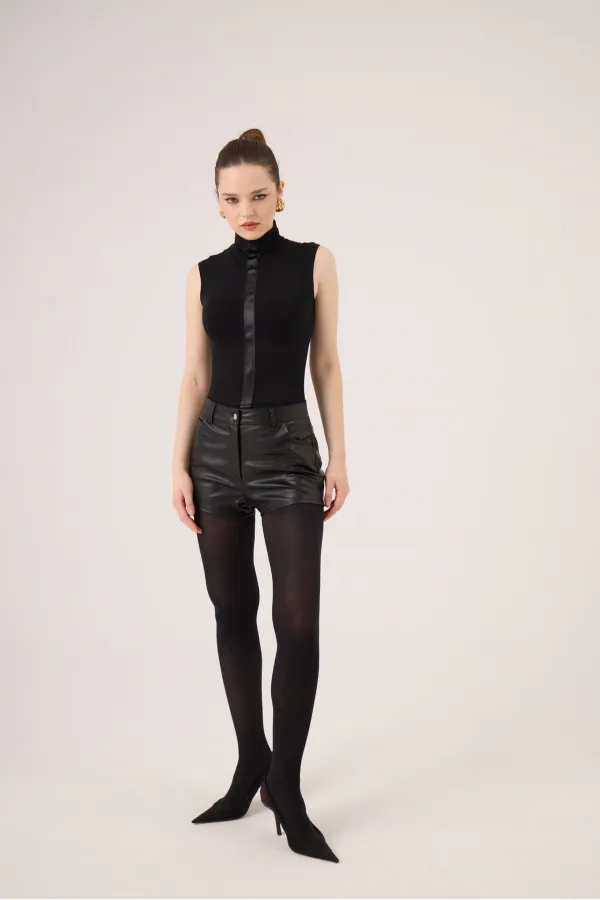 Chemisier Layla sans manches à col roulé en cachemire, noir