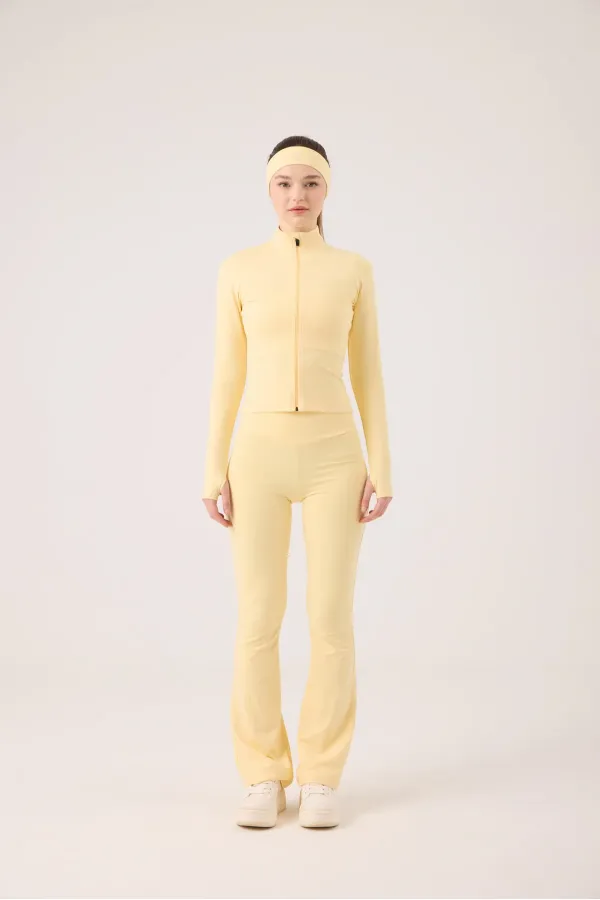 Veste Fabiola avec détails aux doigts et fermeture éclair, jaune