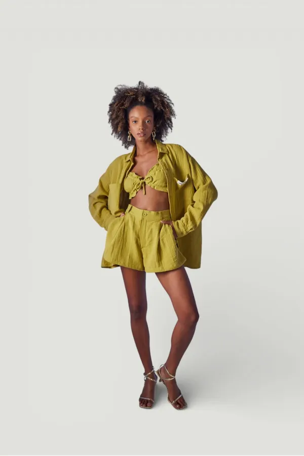 Chemise verte de la plage