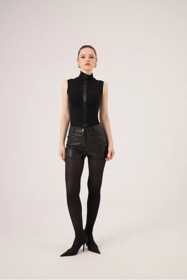 Chemisier Layla sans manches à col roulé en cachemire, noir