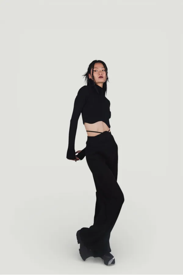 Pantalon en maille stretch noir à taille élastique et jambes larges
