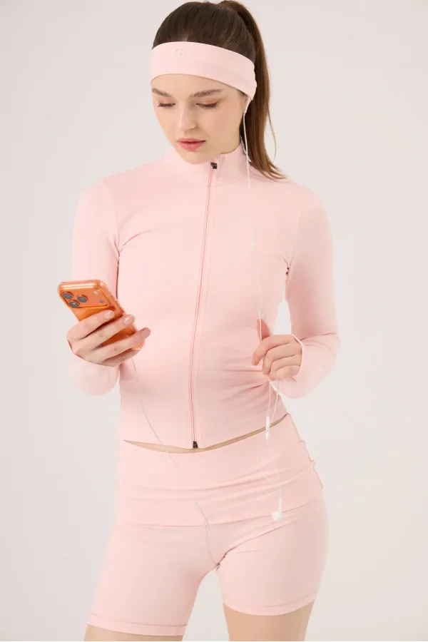 Veste Fabiola avec détails aux doigts et fermeture éclair, rose