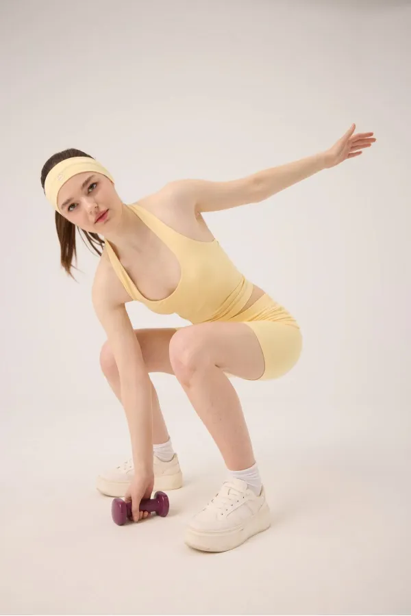 Short mini Kacie jaune à taille croisée