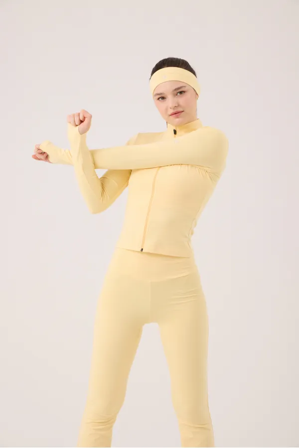 Veste Fabiola avec détails aux doigts et fermeture éclair, jaune