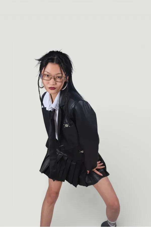 Veste en cuir noire style universitaire