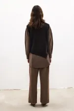 PULL EN MAILLE À COUPE ASYMÉTRIQUE