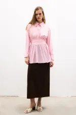 PEPLUM TUNIC WITH CORSET AT THE WAIST