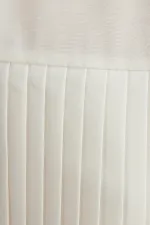 ASYMMETRICAL SHIRT WITH PLEATED DETAILS