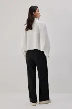 PANTALON EN CRÊPE À FRANGES