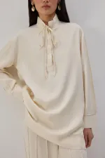 YAKASI BAĞLAMALI DÖKÜMLÜ TUNİK