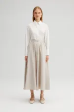 JUPE CUPRA À BOUTONS DORÉS