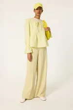 MUSLIN BLOUSE WITH RUFFLED COLLAR MUSLIN BLOUSE WITH RUFFLED COLLAR