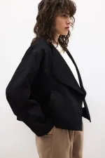 VESTE COURTE À DOUBLE BOUTON