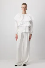 CHEMISE COURTE À VOLANTS