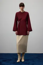 DRAPED BLOUSE WITH METAL ACCESSORIES