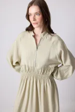 BELİ BÜZGÜLÜ OVERSIZE ELBİSE