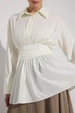 PEPLUM TUNIC WITH CORSET AT THE WAIST