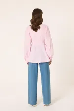 CHEMISE À PÉPLUME RAYÉE